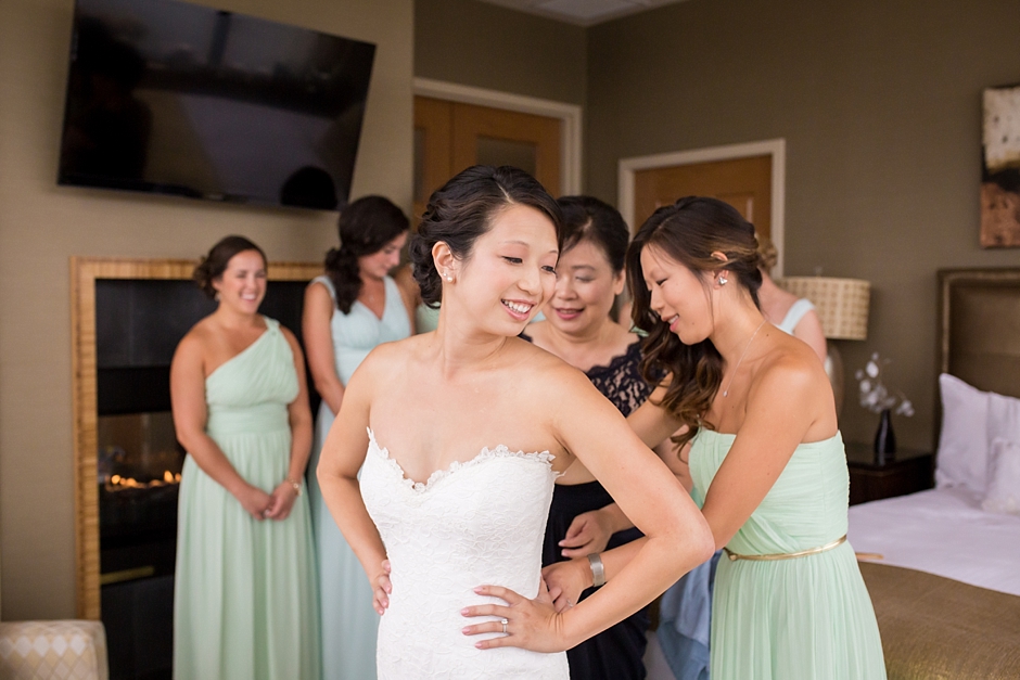 bride getting ready with bridesmaids