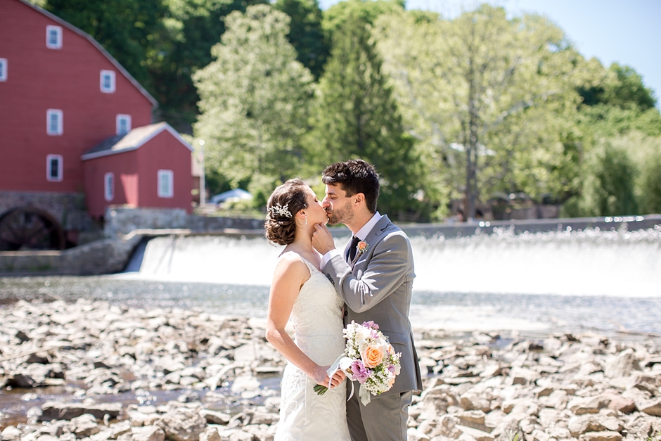 Rustic Red Mill Museum Wedding bride and groom in beautiful light