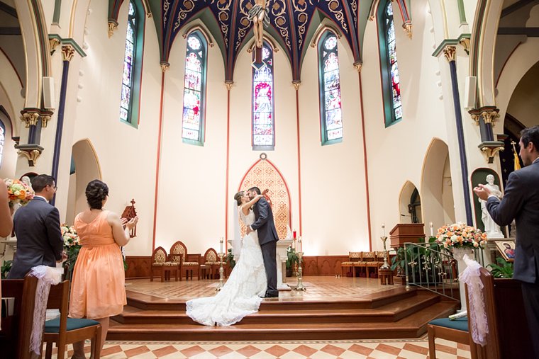 Church of the Assumption bride and groom first kiss photo