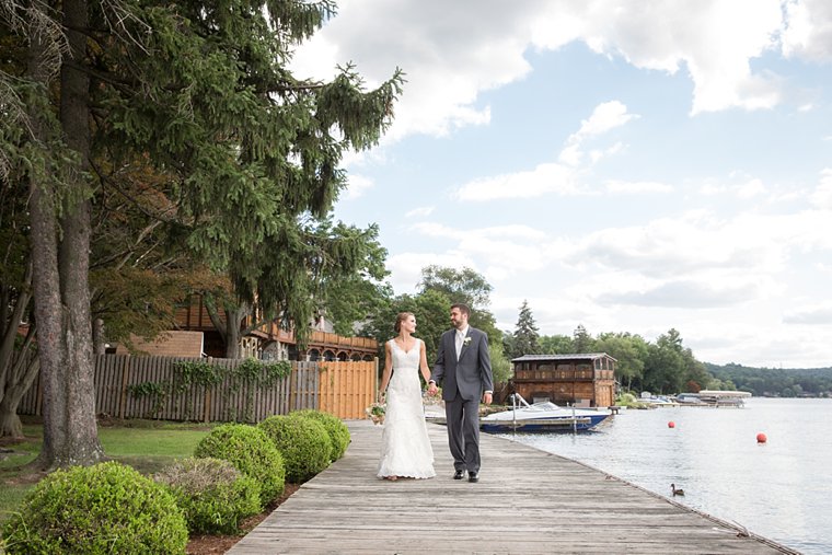 Lake Mohawk Country Club Wedding bride and groom walking on boardwalk photo