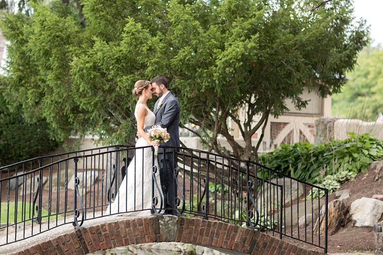 Lake Mohawk Country Club Wedding bride and groom in garden photo