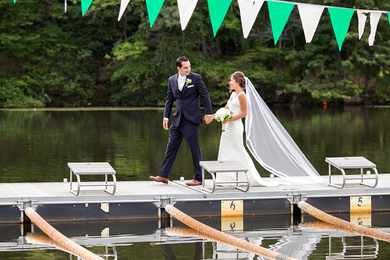 Lake Valhalla Club Wedding photos bride and groom walking on the dock
