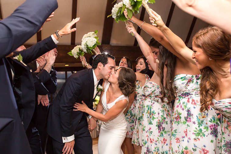 Lake Valhalla Club Wedding photos Kiss under the arch