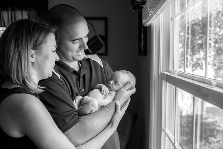 New parents with newborn by Monmouth County Newborn Photographers Idalia Photography