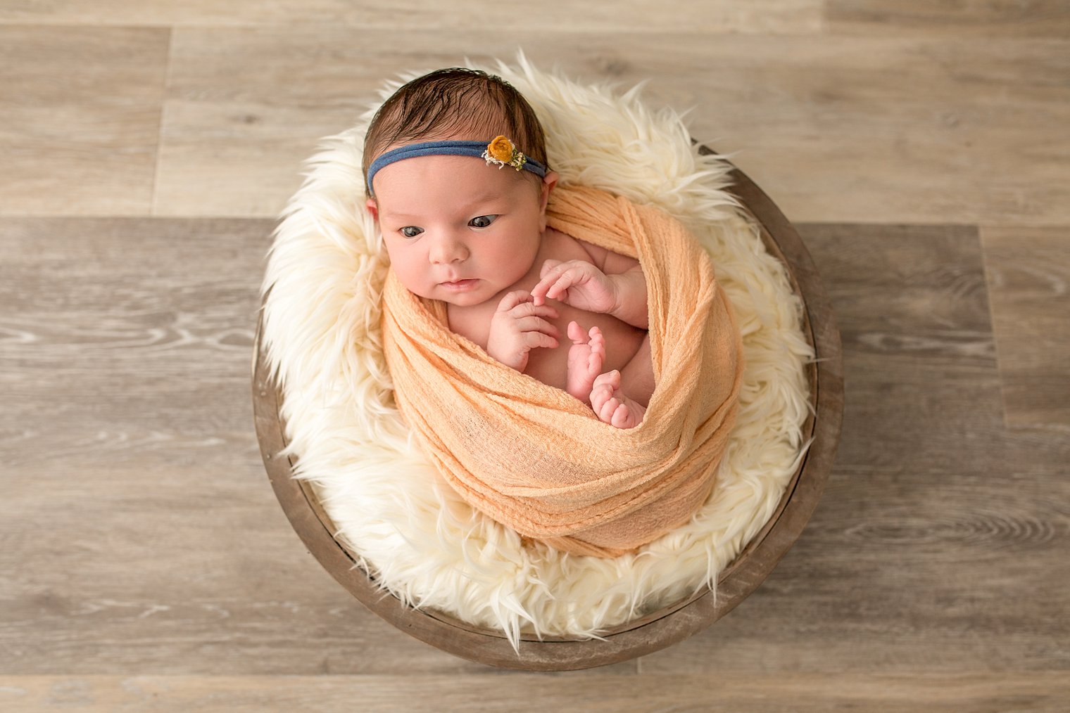 photo of newborn baby girl in basket