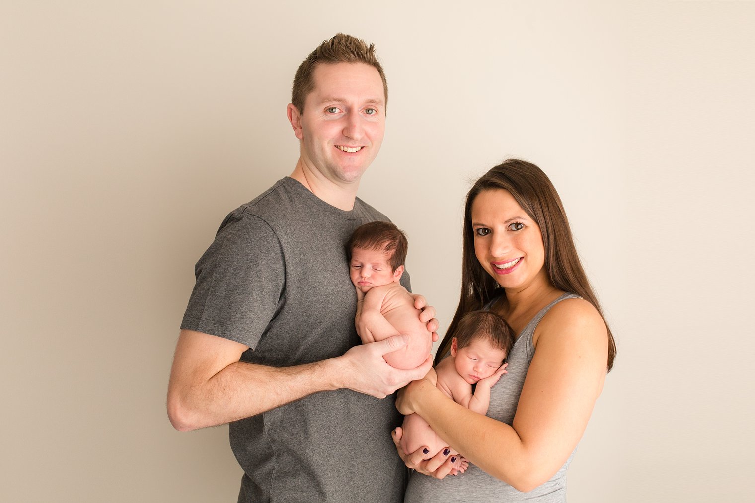 Parents with newborn twins photo