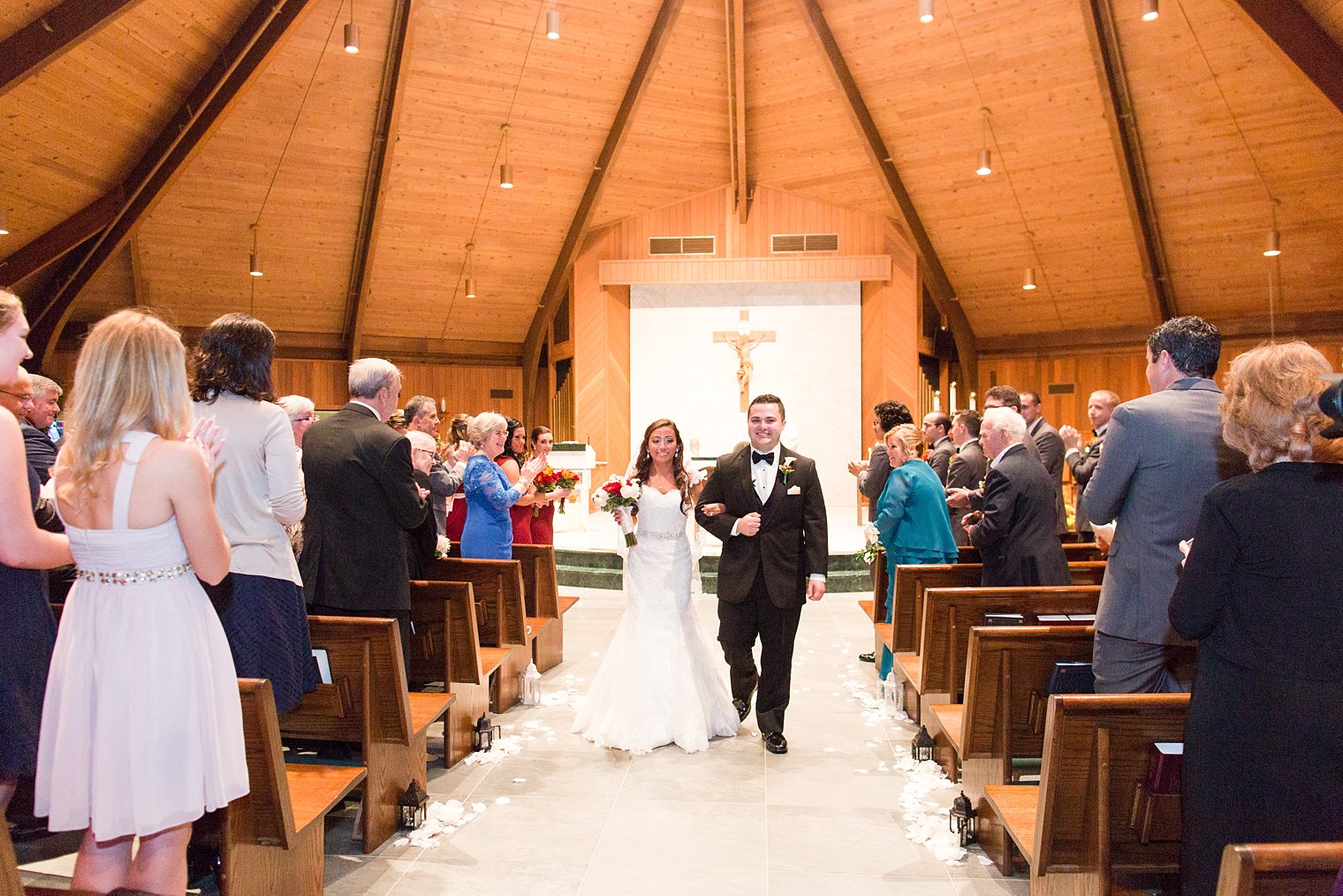 Notre Dame of Mount Carmel Church bride and groom recessional photo