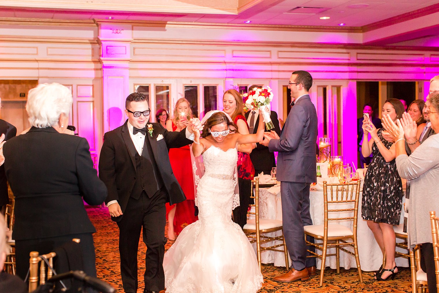 il Tulipano Wedding Photos bride and groom reception entrance photo