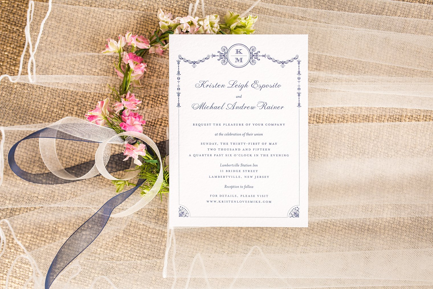 blue and ivory wedding invitation with monogram 