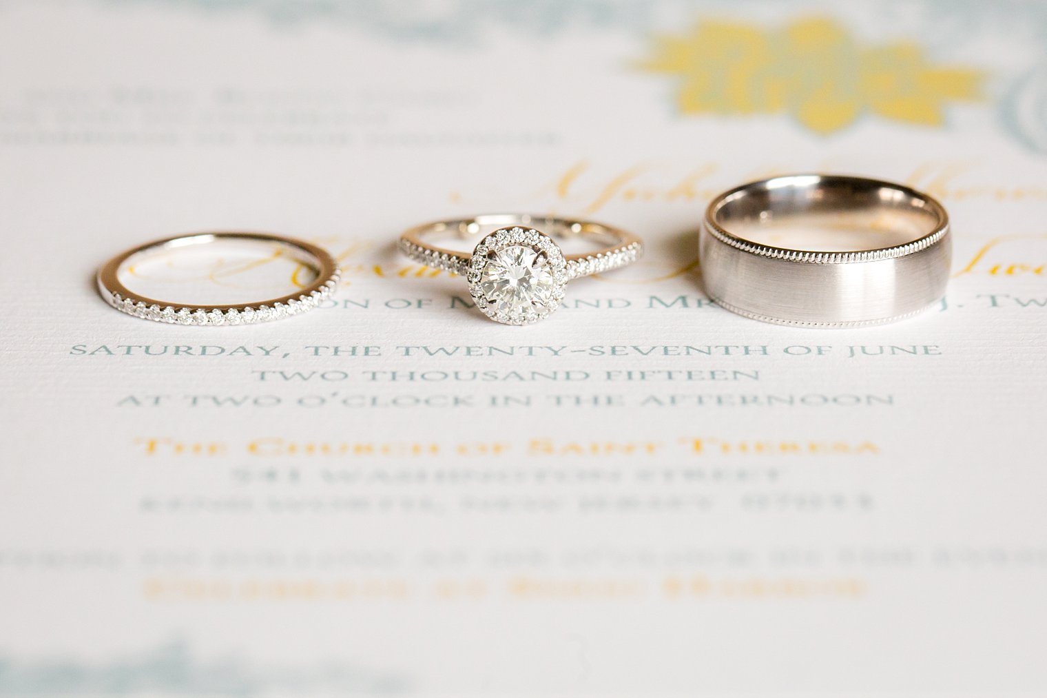 rings on yellow and gray invitation