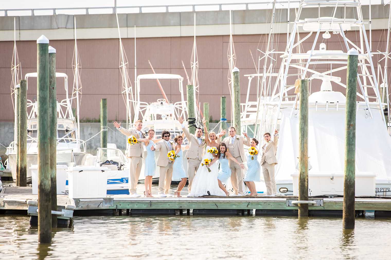 Crystal Point Yacht Club bridal party photo on dock