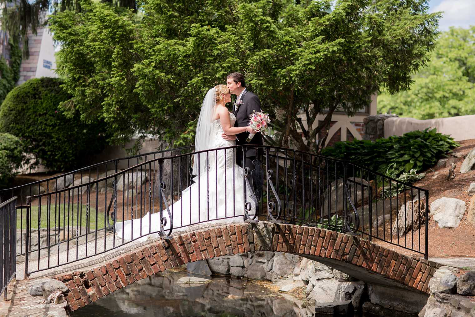 Lake Mohawk Country Club bride and groom on the bridge photo
