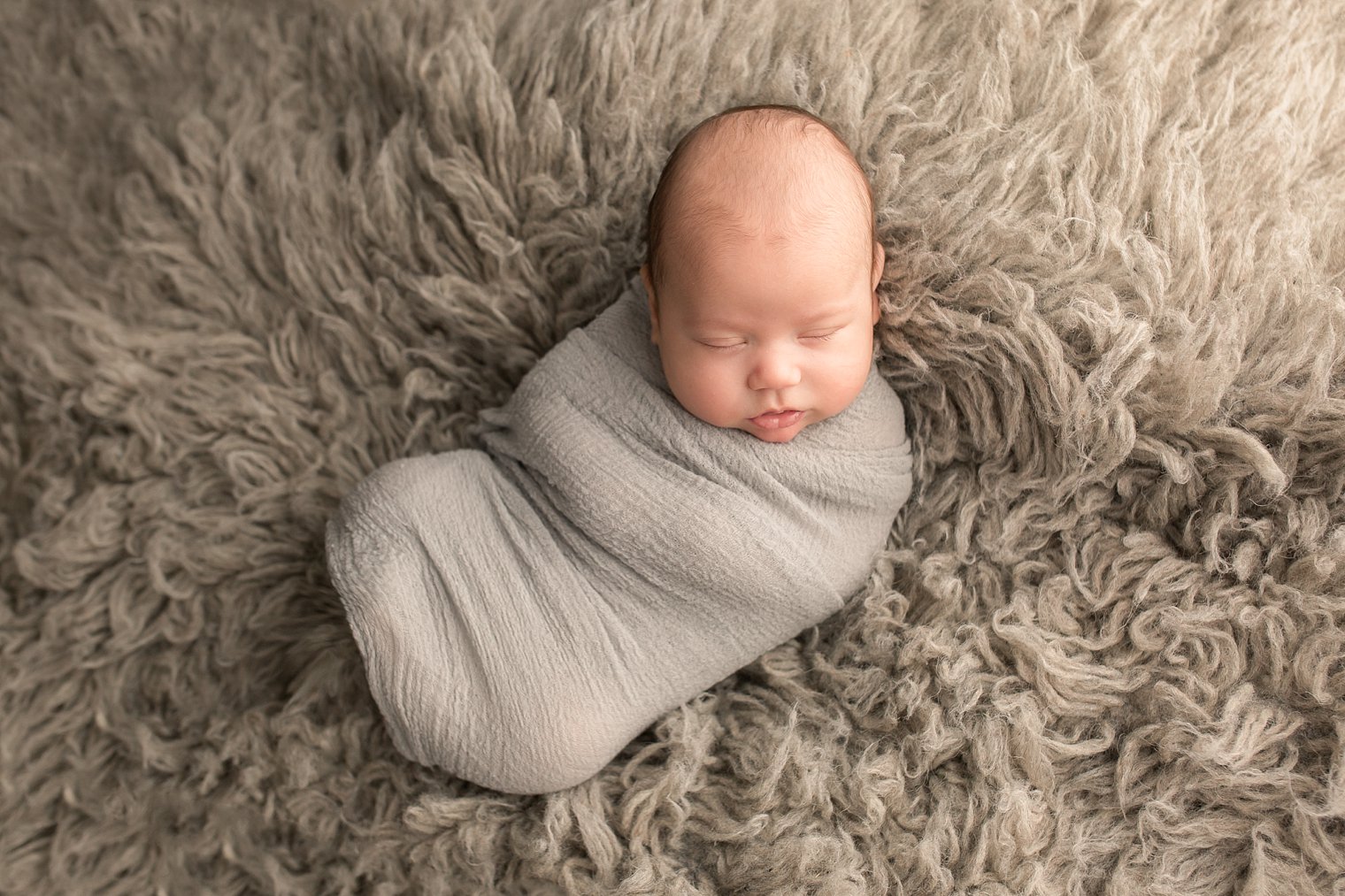 Central NJ Newborn Photographers baby in gray