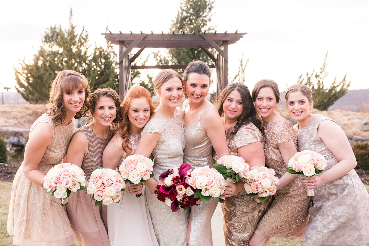 Photo of bridesmaids in champagne dresses