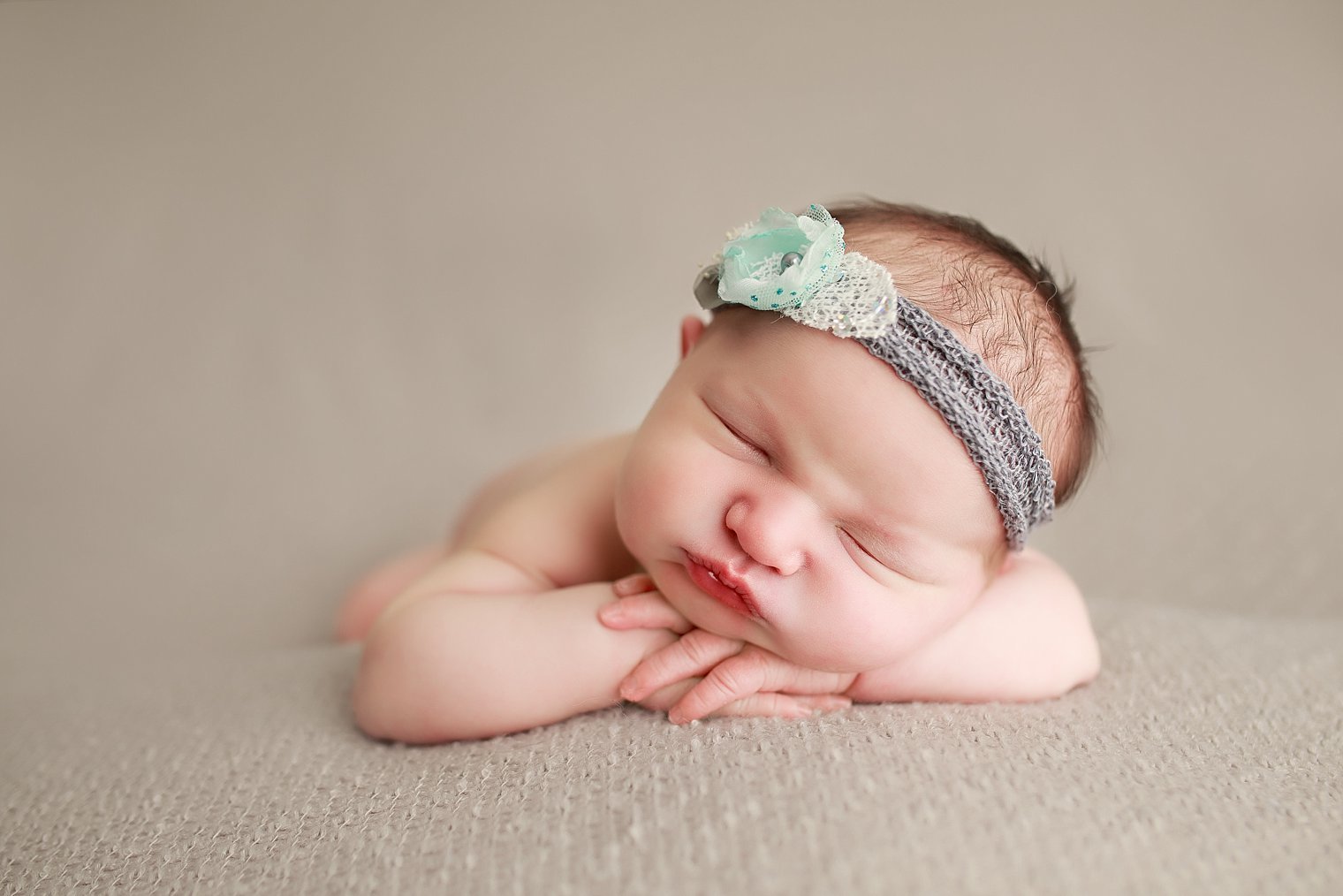 newborn baby girl in aqua and gray headband