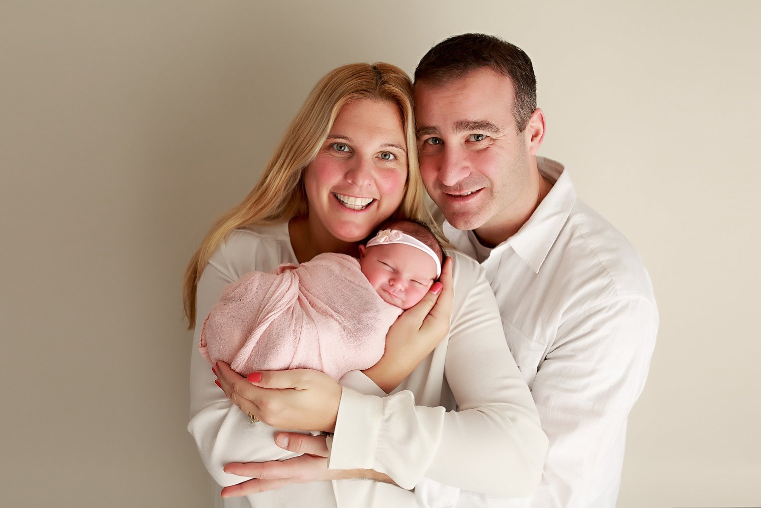 parents with new baby girl