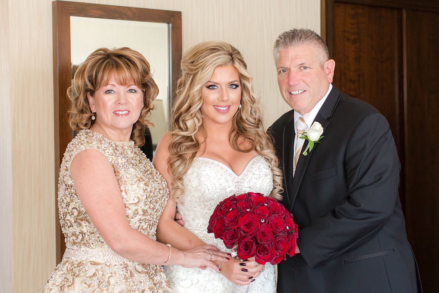 Bride and her parents on her wedding day
