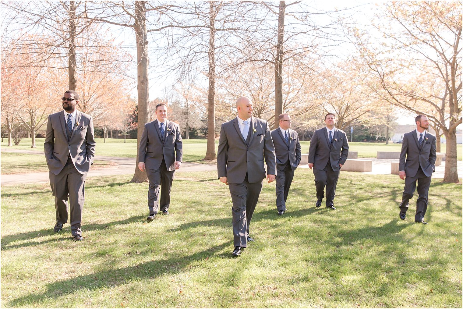 Groomsmen in gray suits