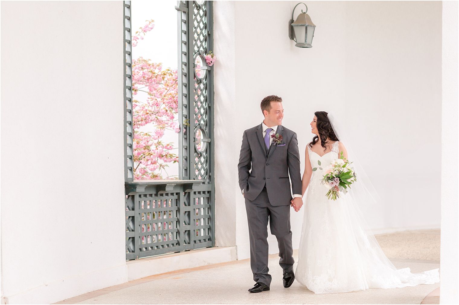 Bride and groom strolling