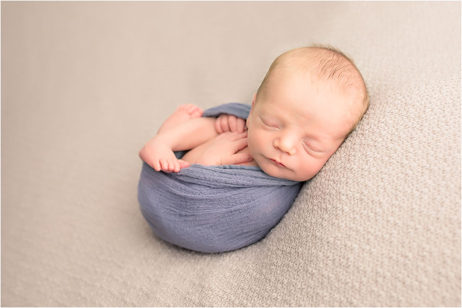 Sleeping newborn boy