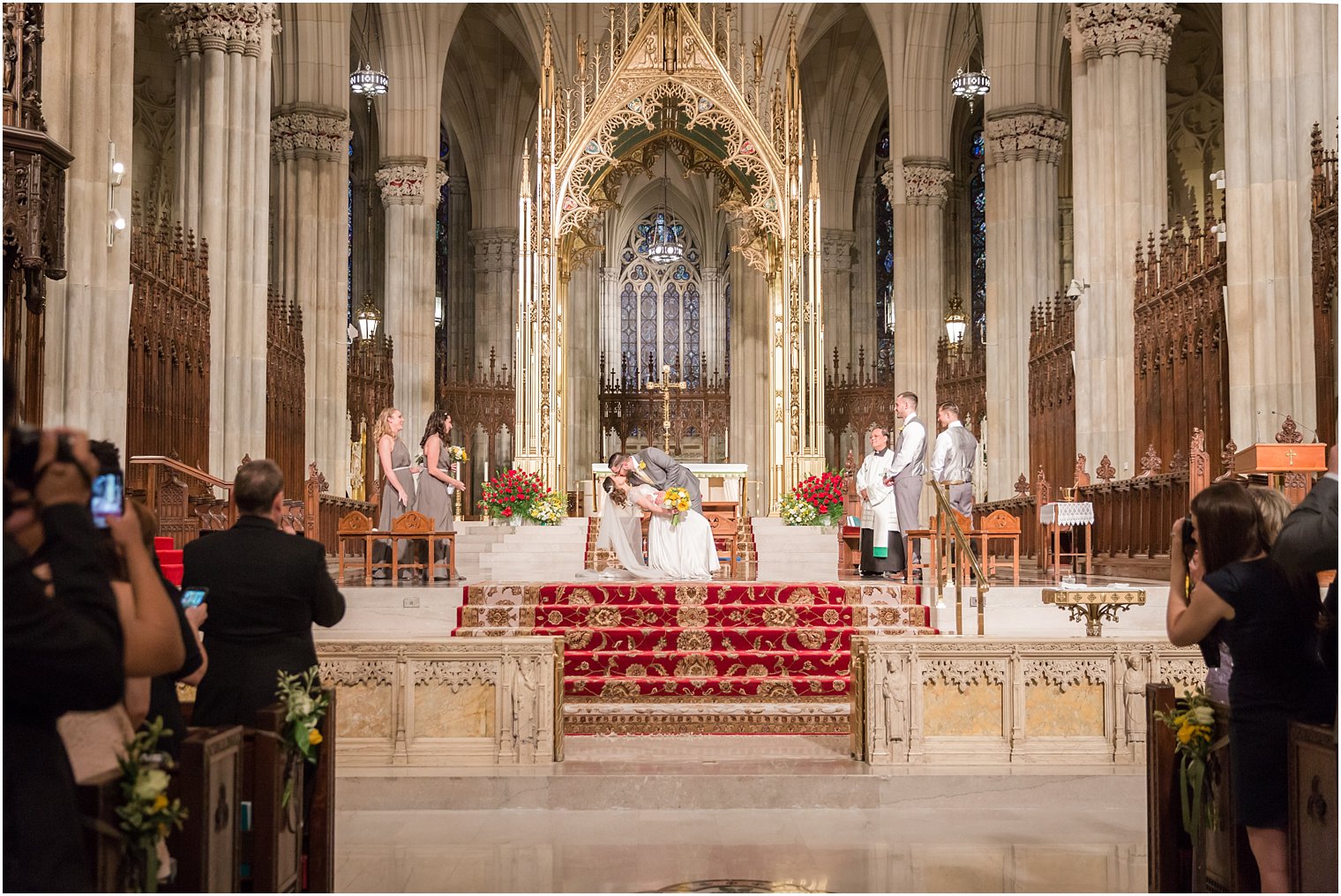 St. Patrick's Cathedral Wedding Groom dipping Bride