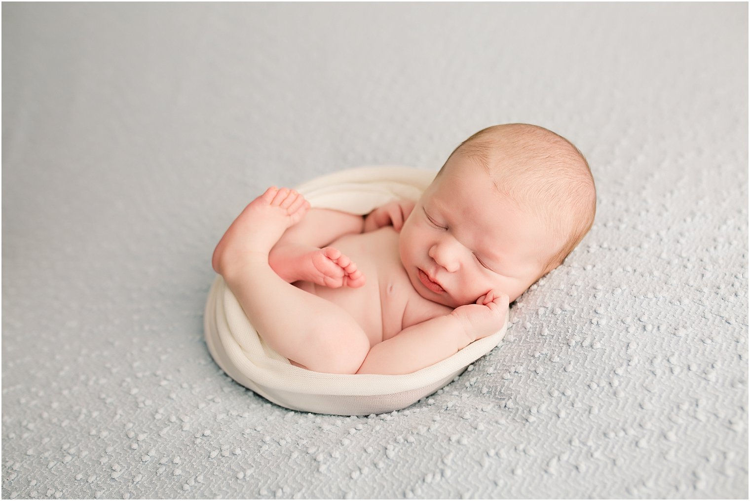 Sleeping newborn boy