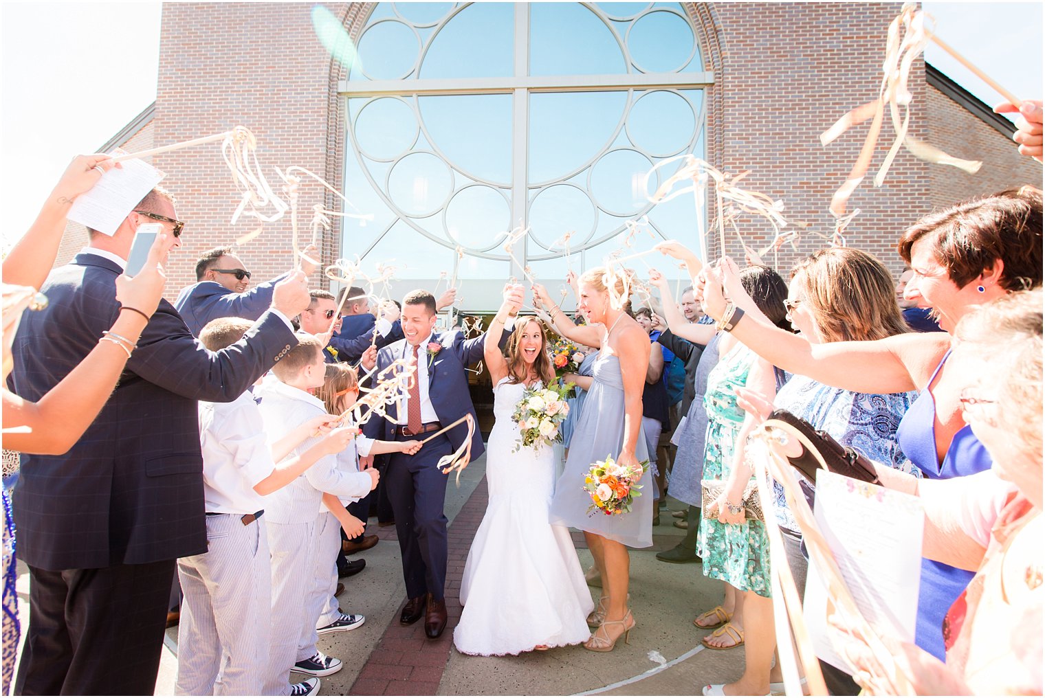 Church exit with ribbon wands