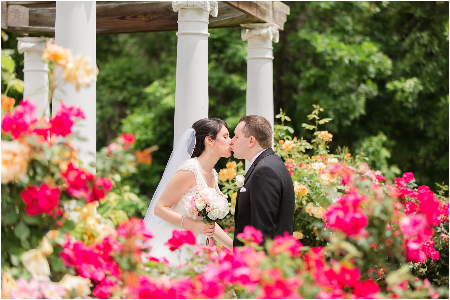 Bride and groom kissing