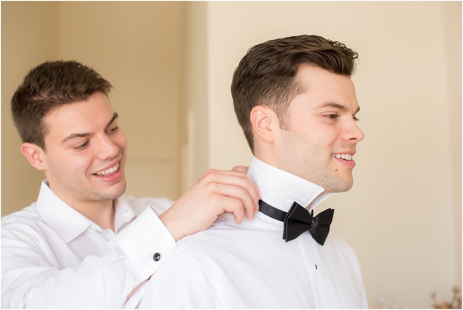 Groom getting ready with brother