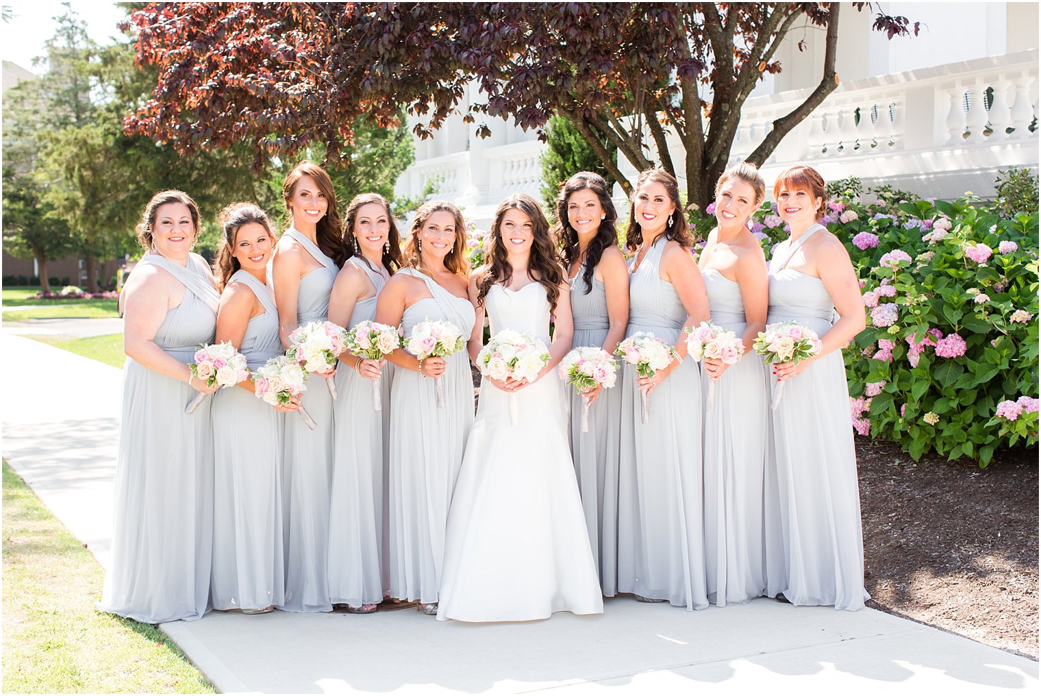 Bridesmaids in gray David's Bridal dresses