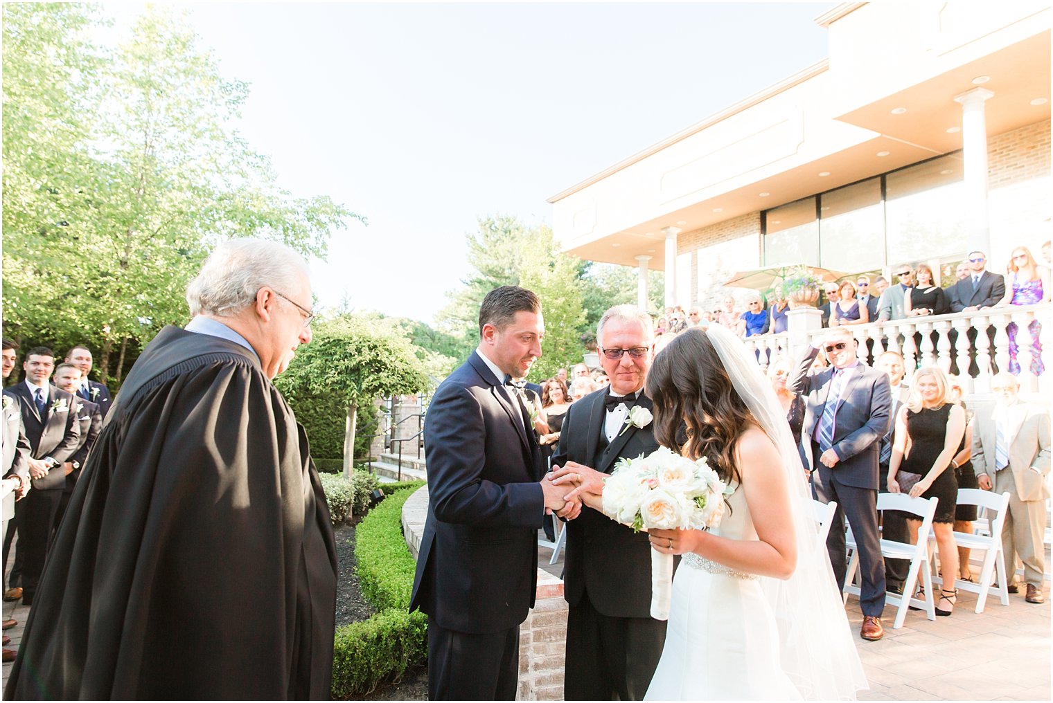 Father giving away bride