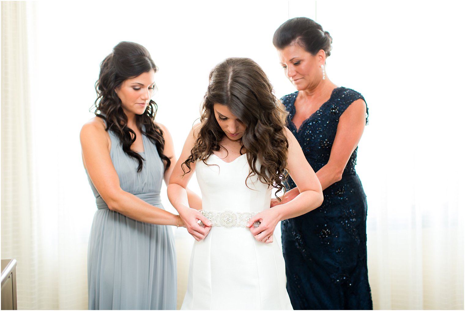 Bride with mother and maid of honor
