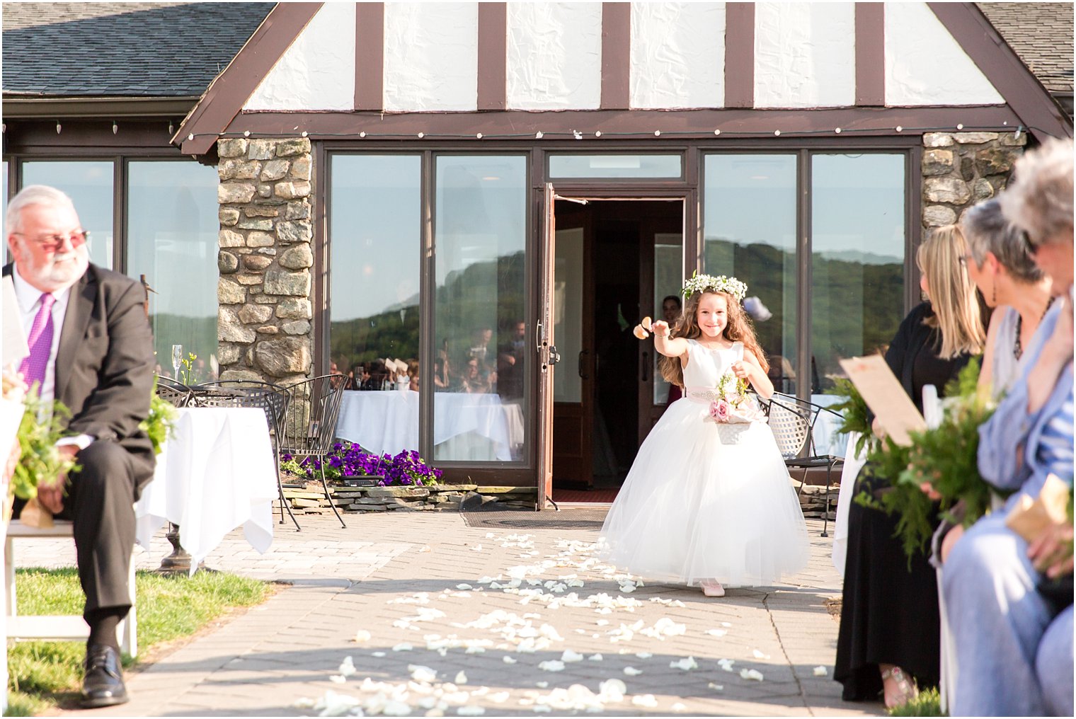 Flower girl throwing petals