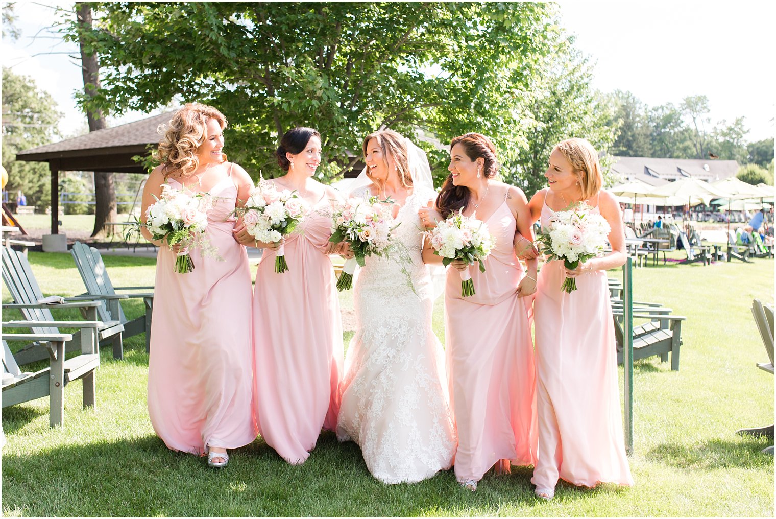 Bridesmaids in long pink dresses