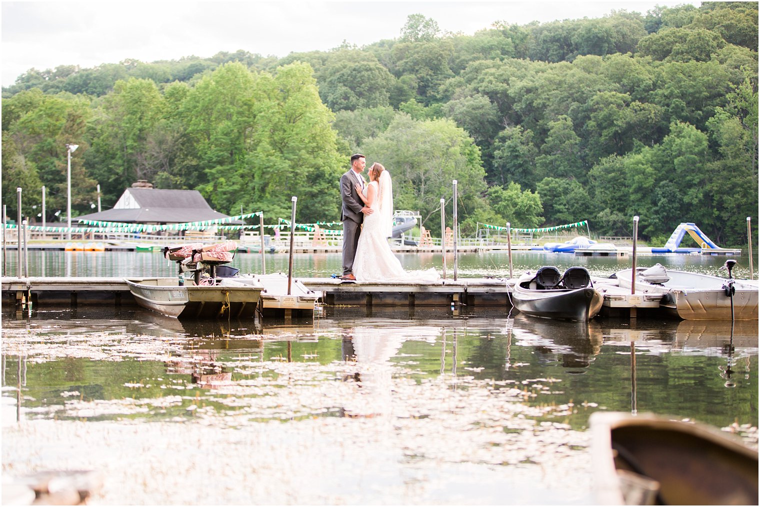 Bride and groom on docks