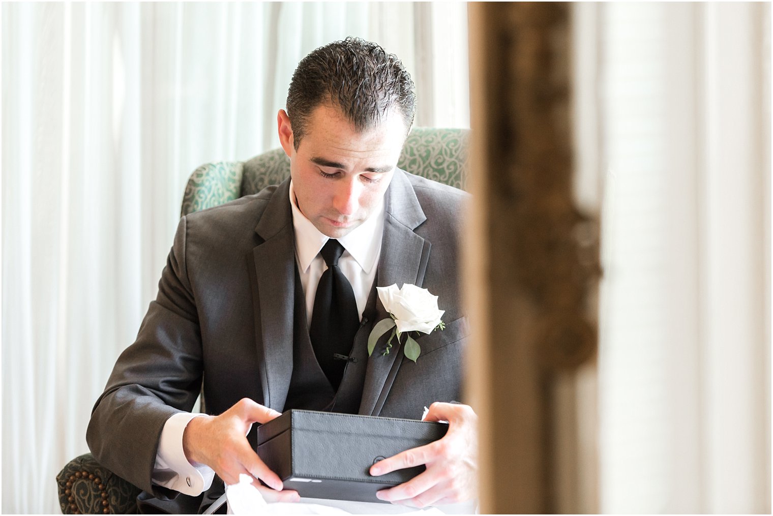 Groom opening gift