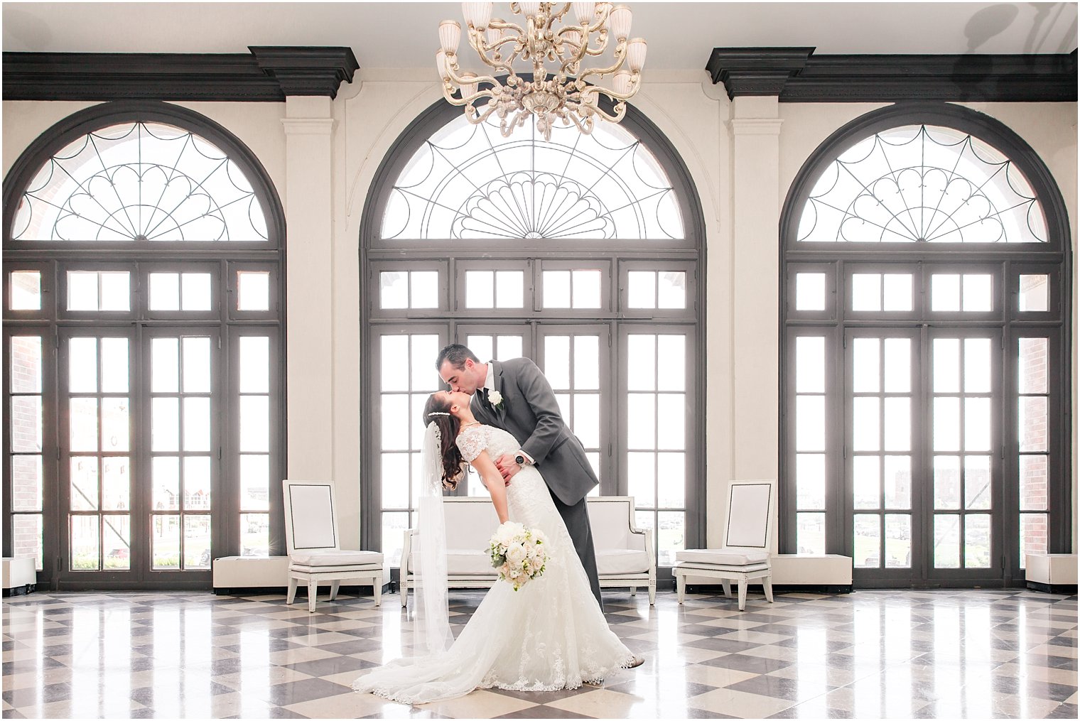 Groom dipping bride at Berkeley Oceanfront Hotel