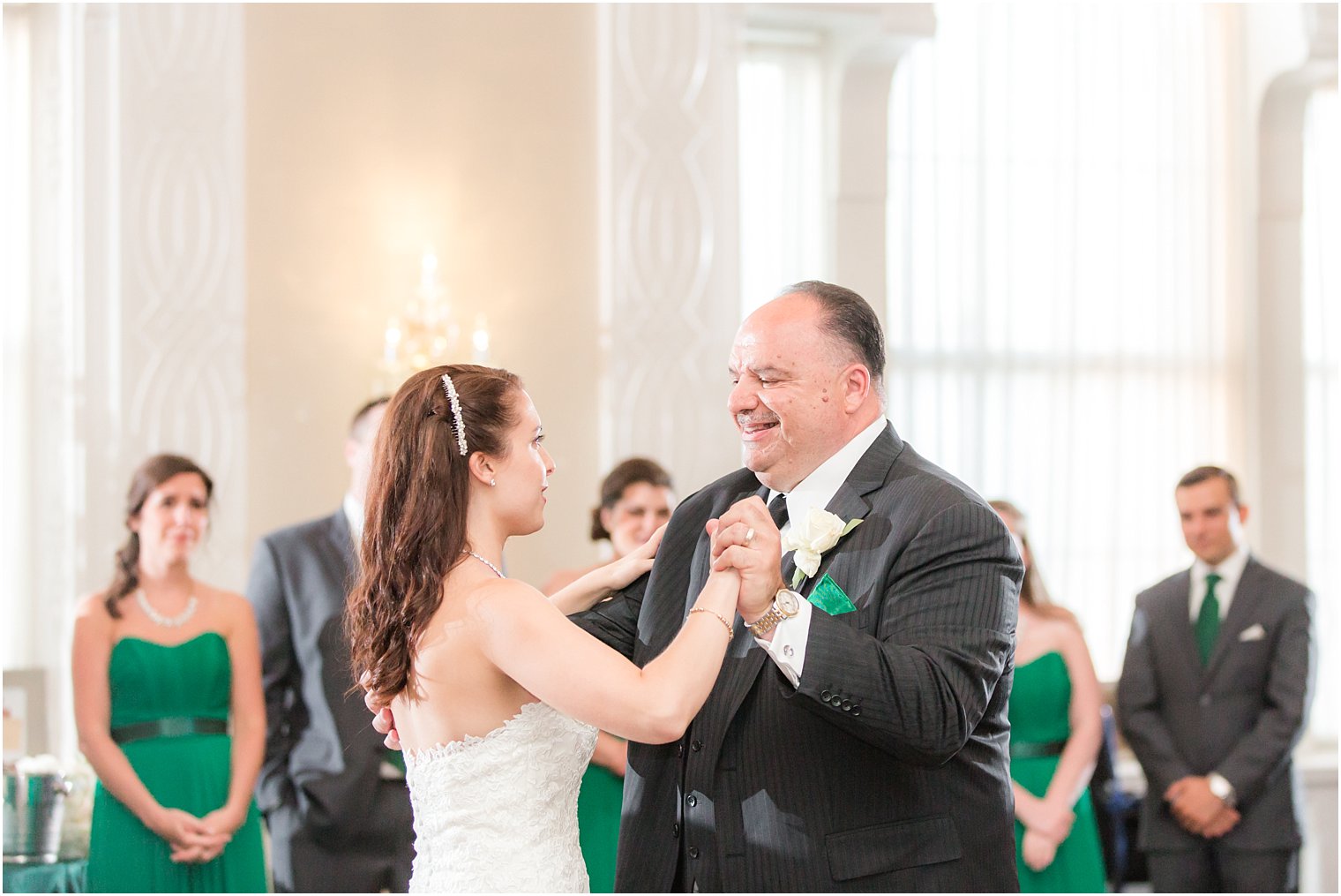 Bride dancing with father