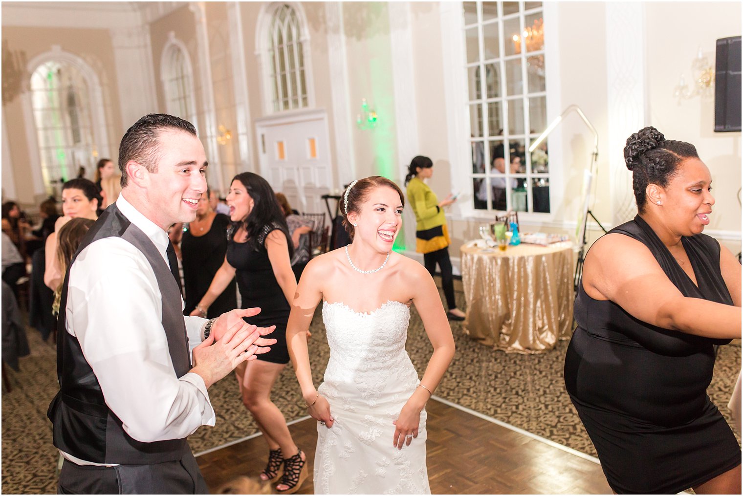 Bride and groom having fun at reception