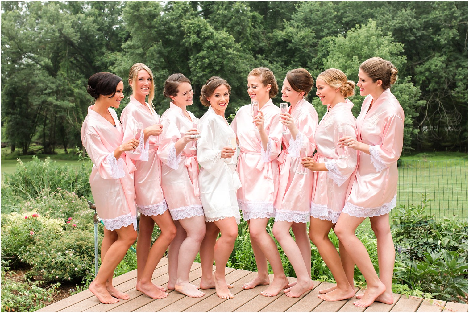 Bridesmaids in pink robes