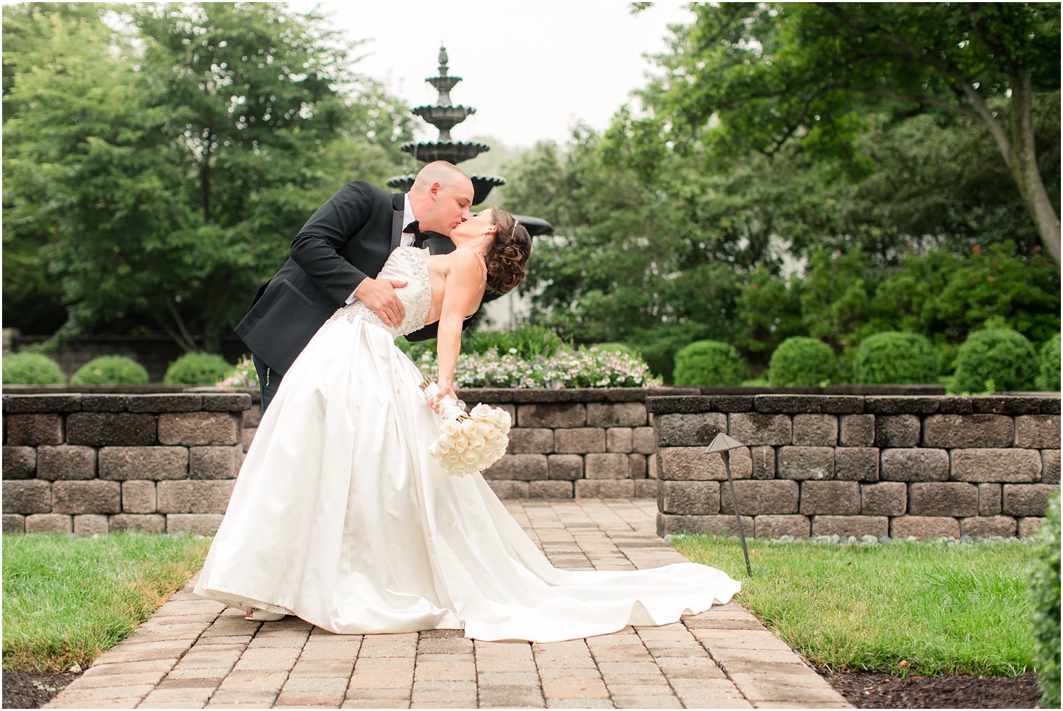 Bride and groom dip photo