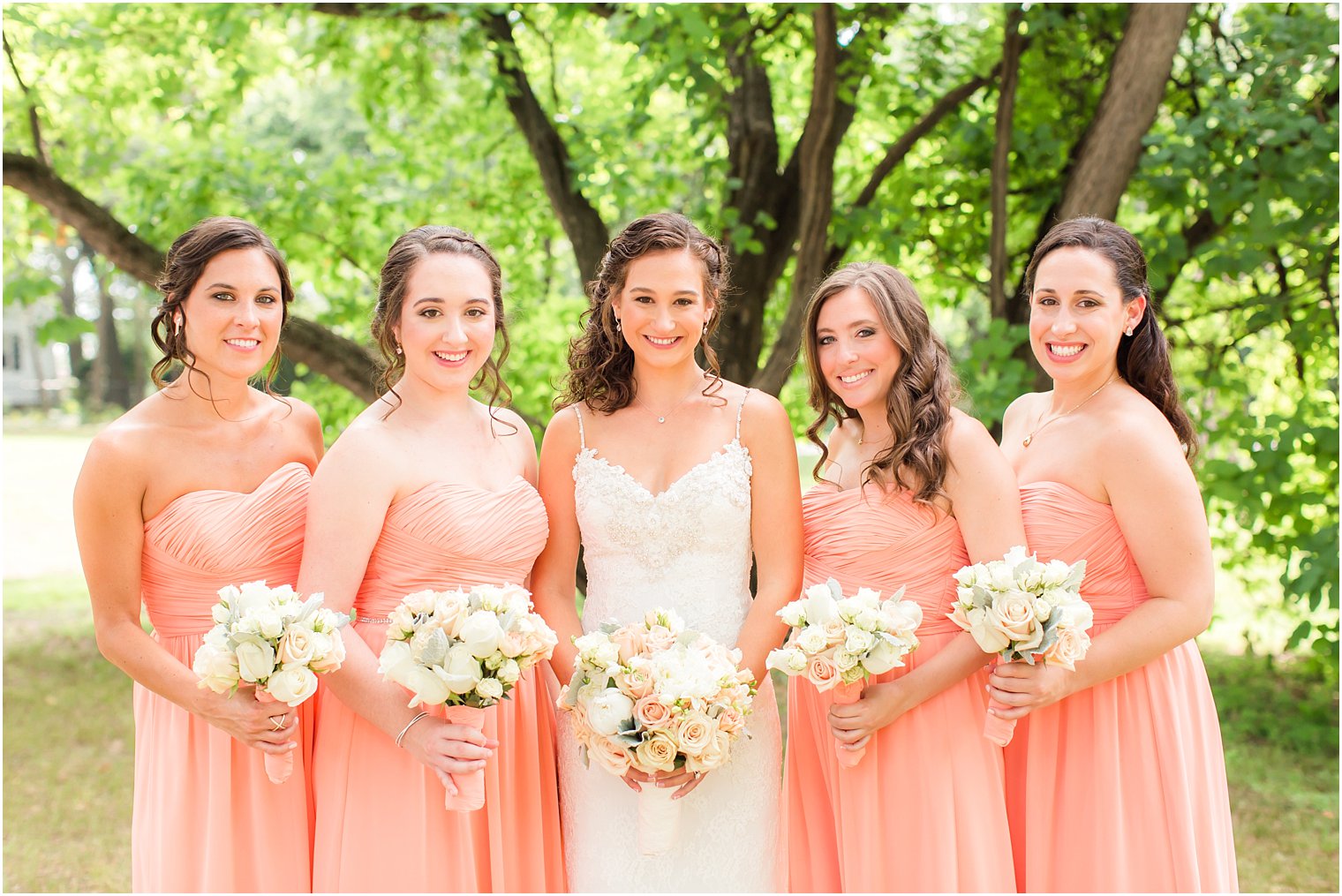 Bridesmaids in Donna Morgan peach dresses