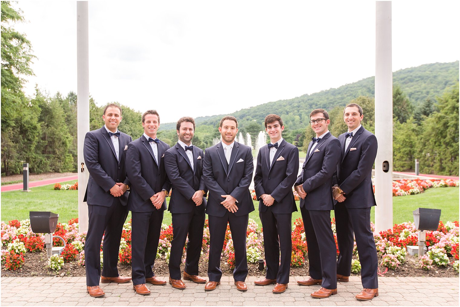 Groomsmen in blue tuxedos