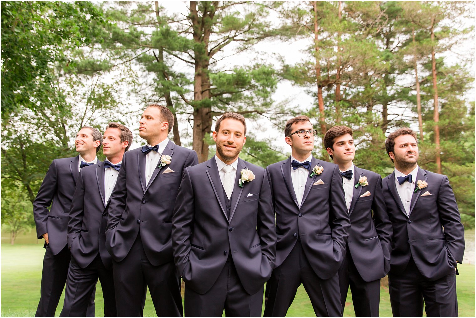 Groomsmen in tuxedos by Joseph Abboud