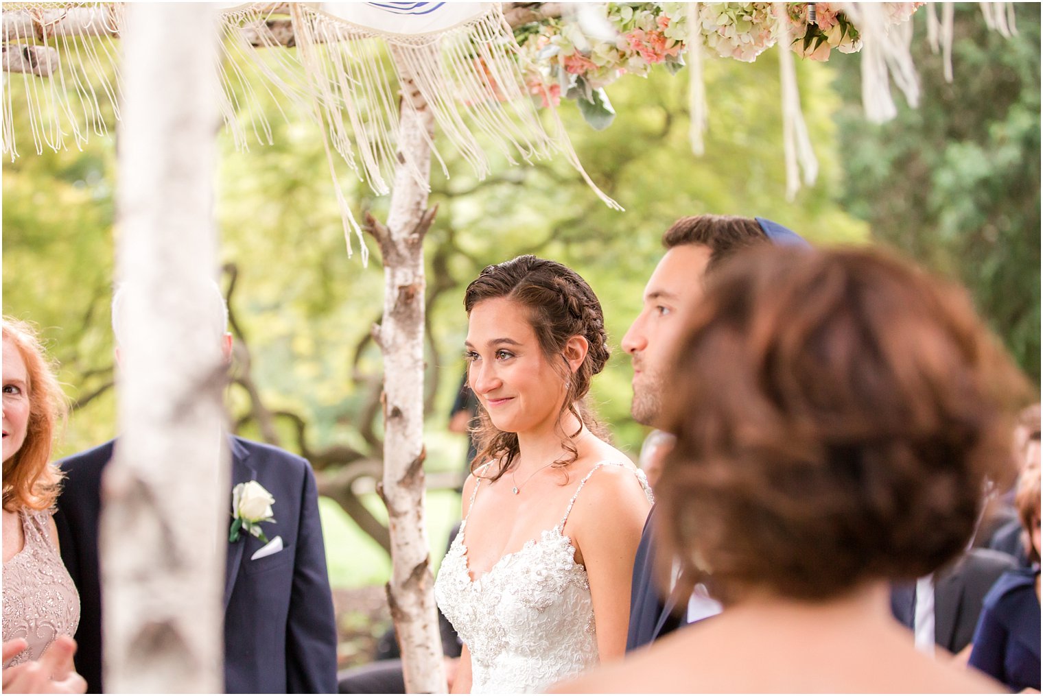 Bride and groom under the chuppah