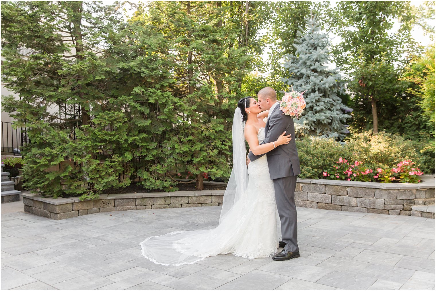 Bride and groom in courtyard