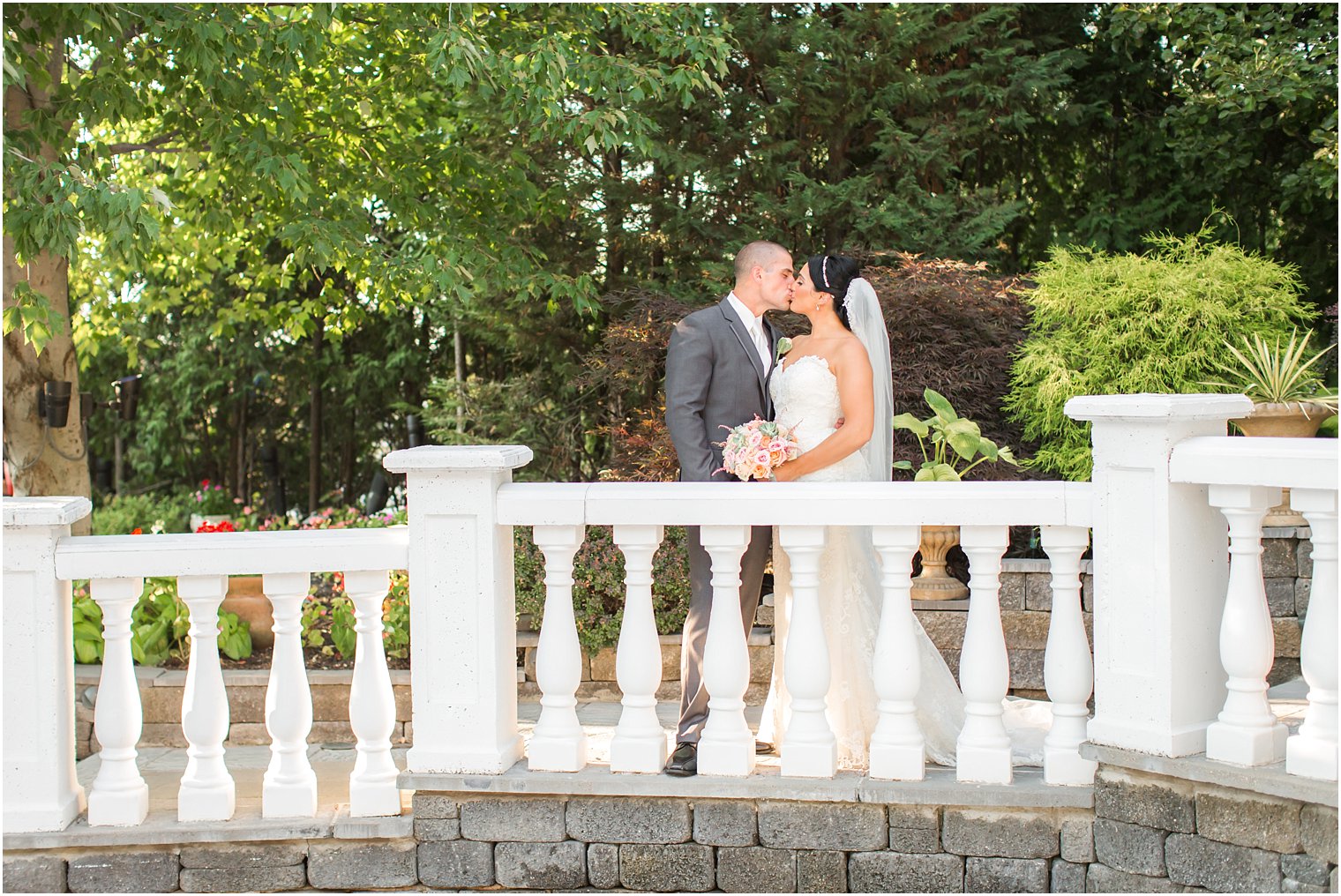 Bride and groom in courtyard