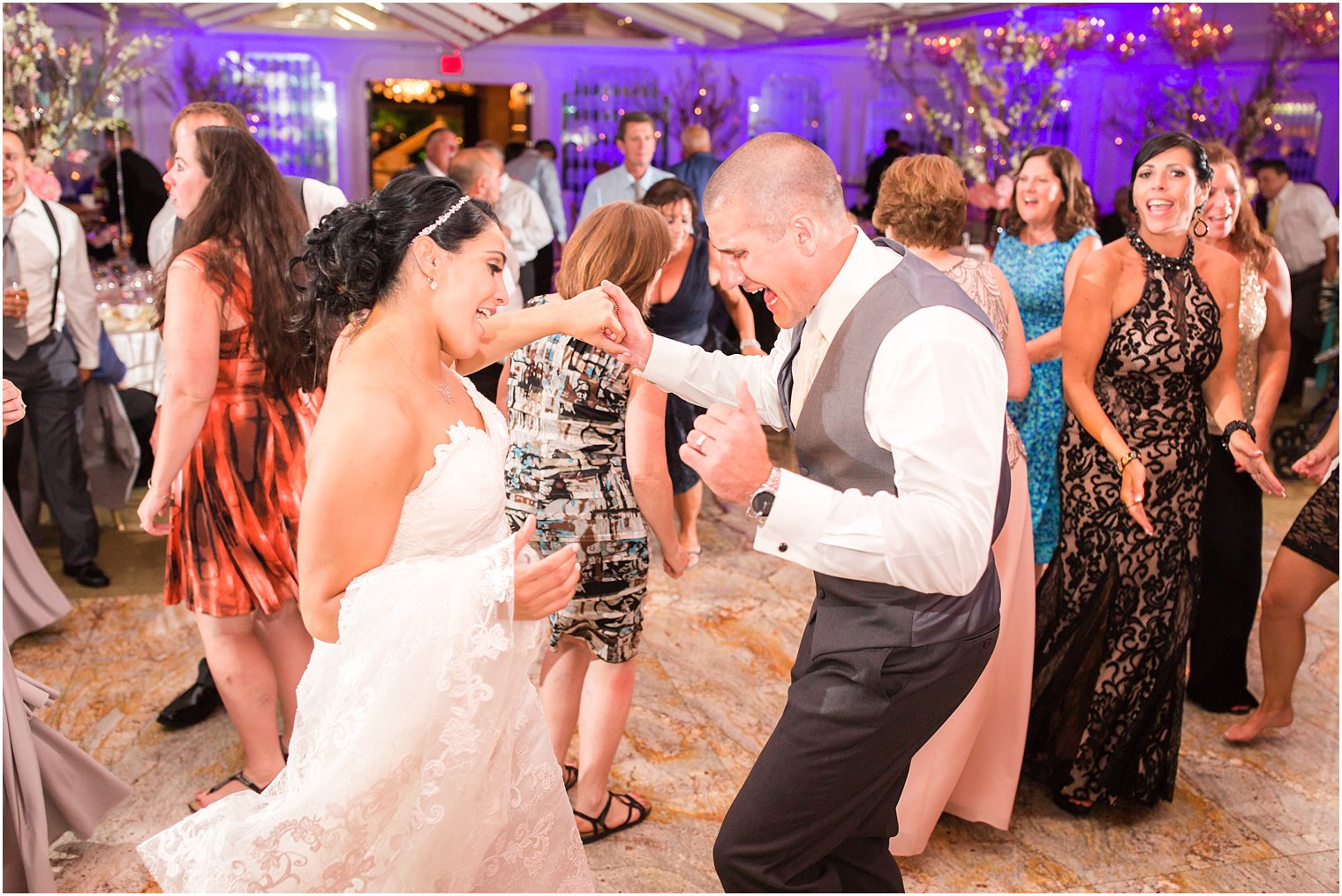 Bride and groom dancing on dance floor