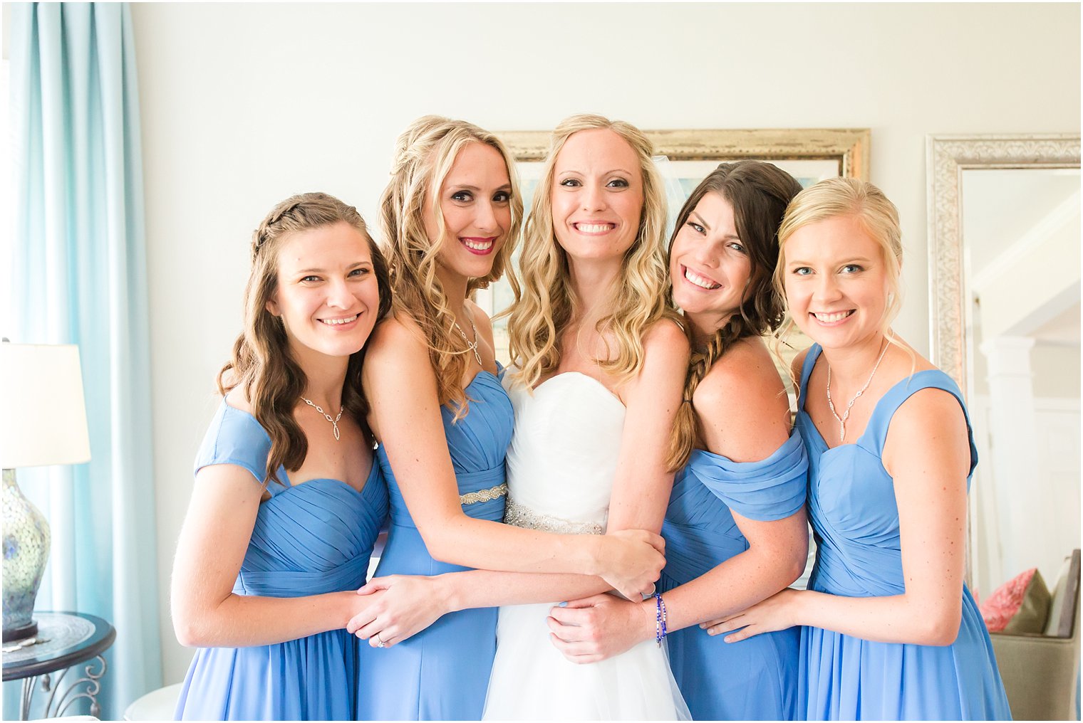 Bridesmaids in blue dresses