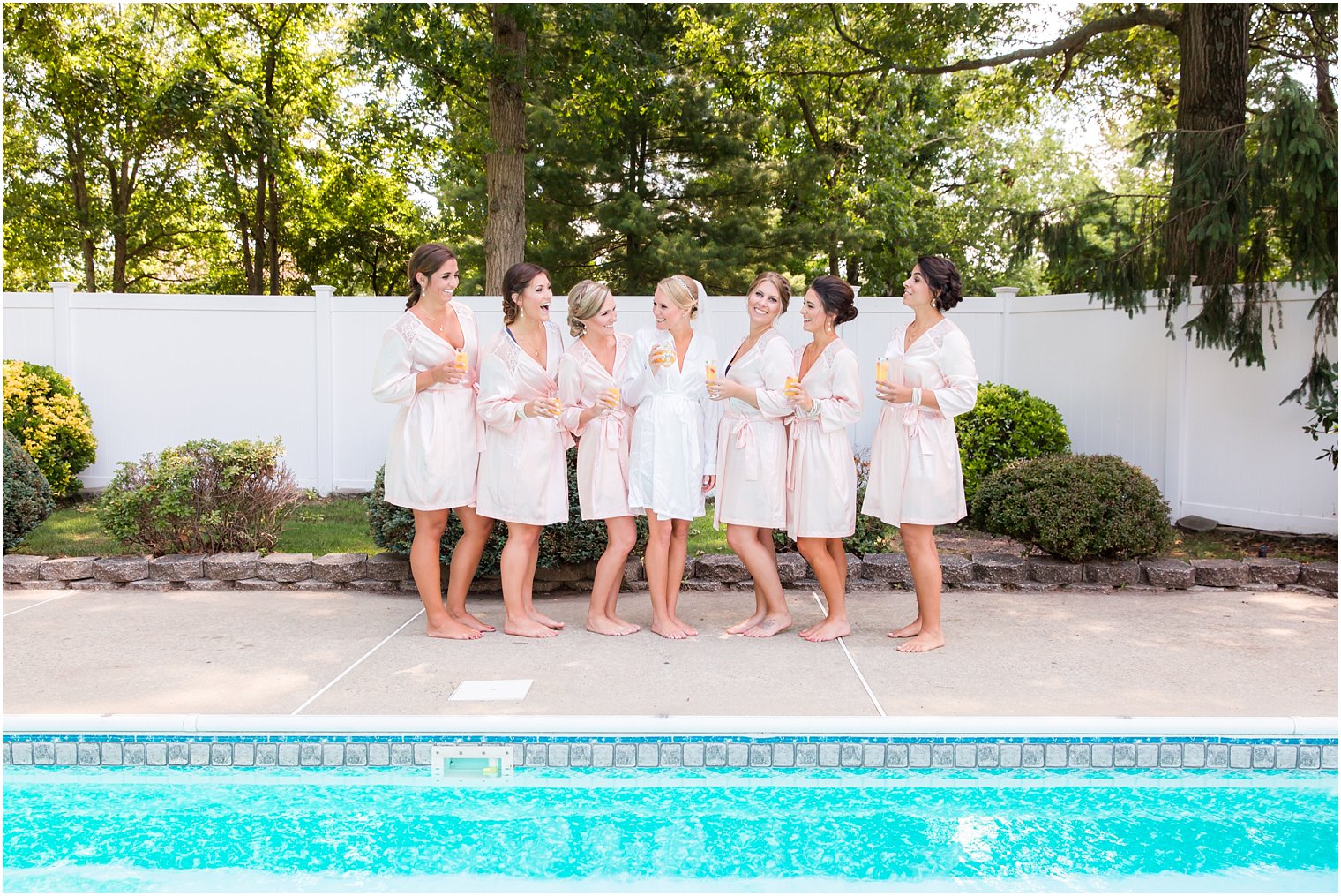 Bridesmaids in pink robes